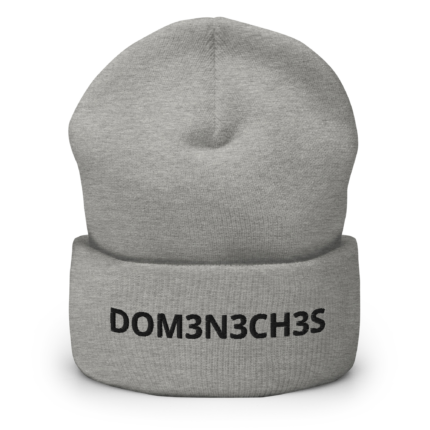 Gray textured bust sculpture with the text DOM3N3CH3S printed across the chest.