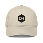 Beige baseball cap shown from the front with a black DH logo on the front panel.
